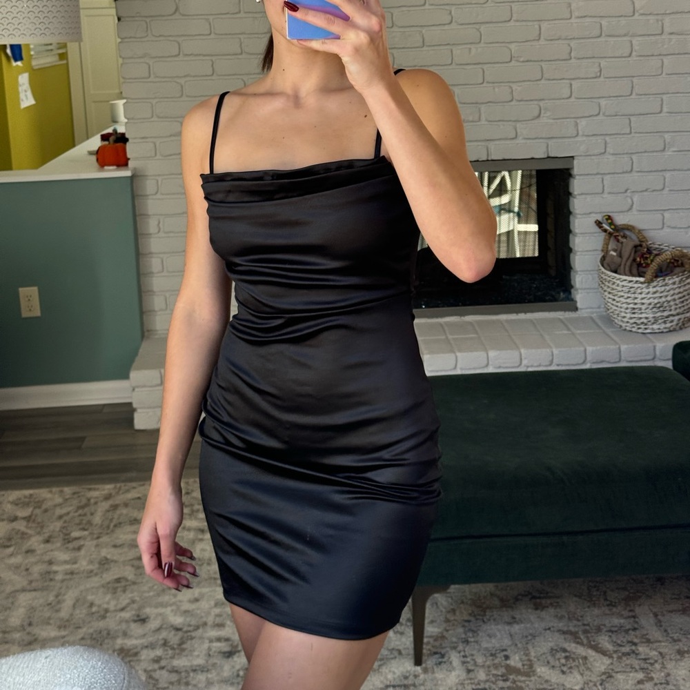 Mini black dress.
